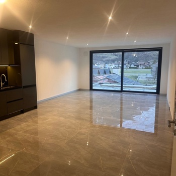 Top moderne 2.5 ZW mit 50m2 Terrasse u. E-Ladestation Bild 2