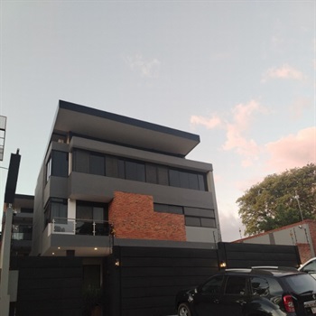 Neubau-Hotel mit Wohnhaus in San Antonio / PY Bild 4